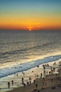 beach, sea, sunset, coast, people, tourism, crowd, nature, golden sunset, water, sand, coastline, seashore, waves, horizon, seascape, scenery, evening, kerala, kerala tourism, varkala